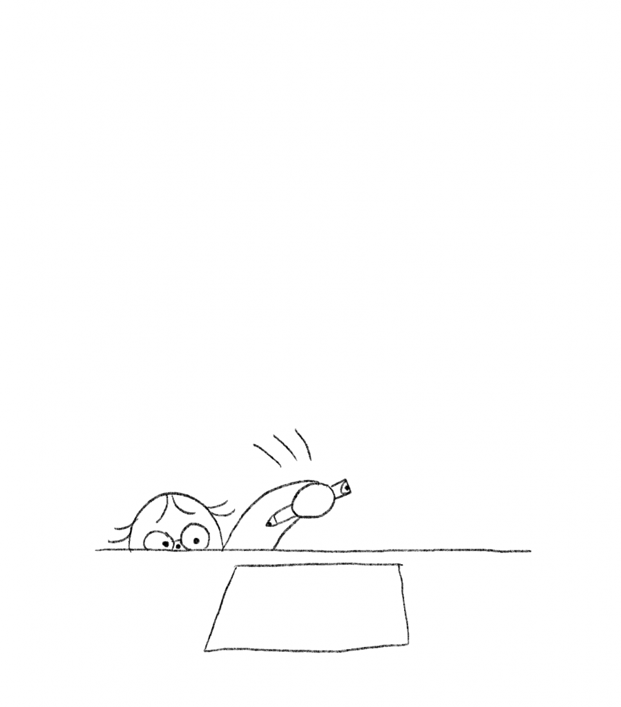 The tutor places a pencil on a blank piece of paper. 